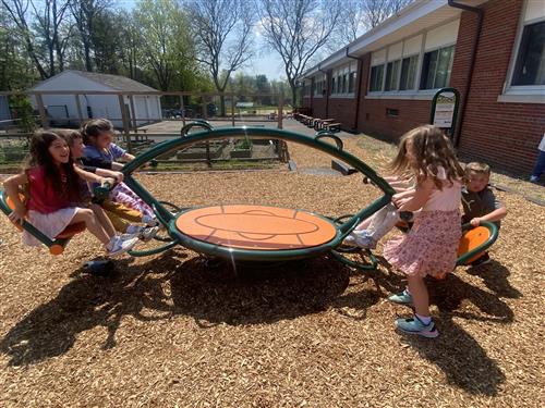 Students enjoy the new playground.